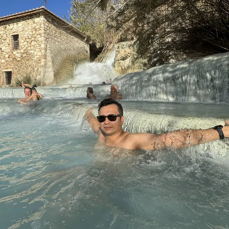 Abozar relaxing in the warm natural pools at Saturnia